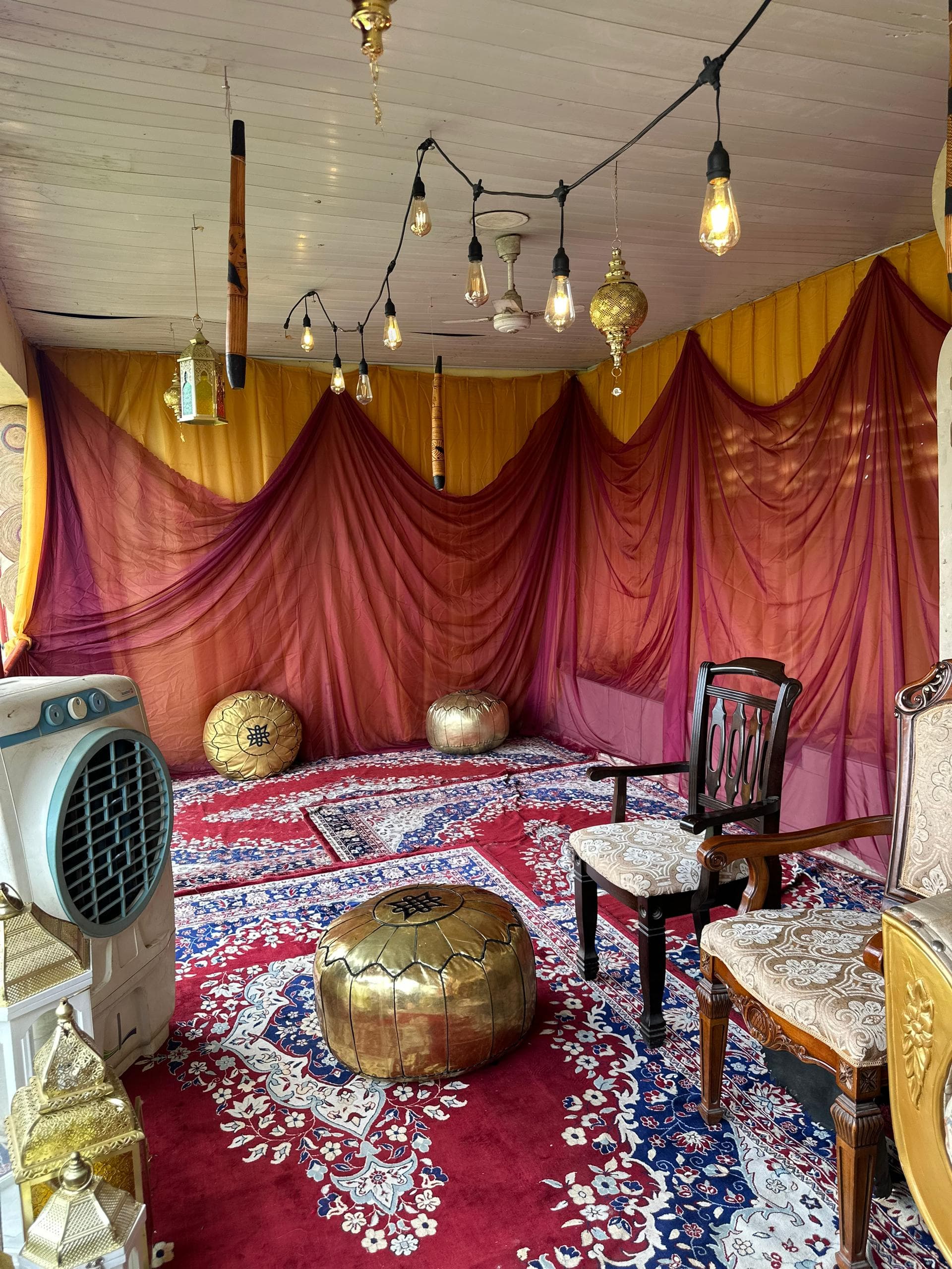 Durbar decoration Lagos, cultural textile accents and ornate candelabra arrangement