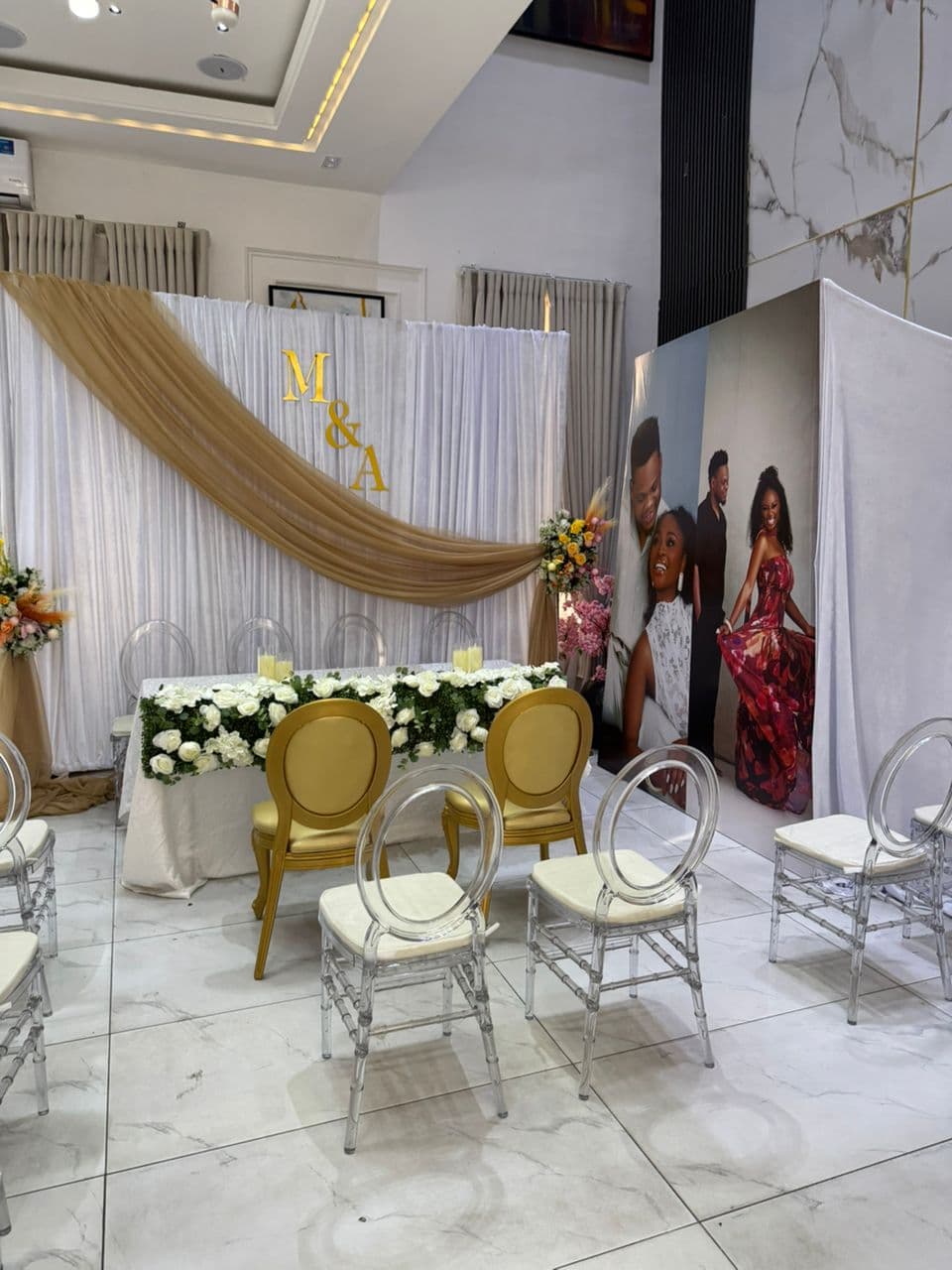 Kamu decoration Lagos, vibrant throne area and cultural fabric draping